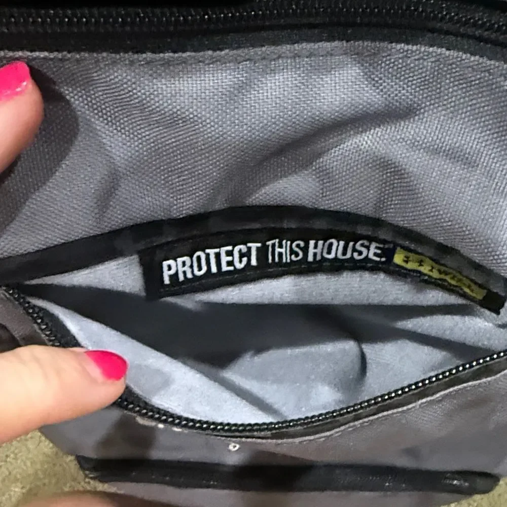 Under Armour Black and Gray Backpack with Yellow Accents